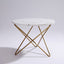 White marble top coffee / side table with intertwined hairpin legs in champagne gold chrome finish.