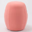 Portable pink cashmere pouf / stool with a brown synthetic leather strap handle.